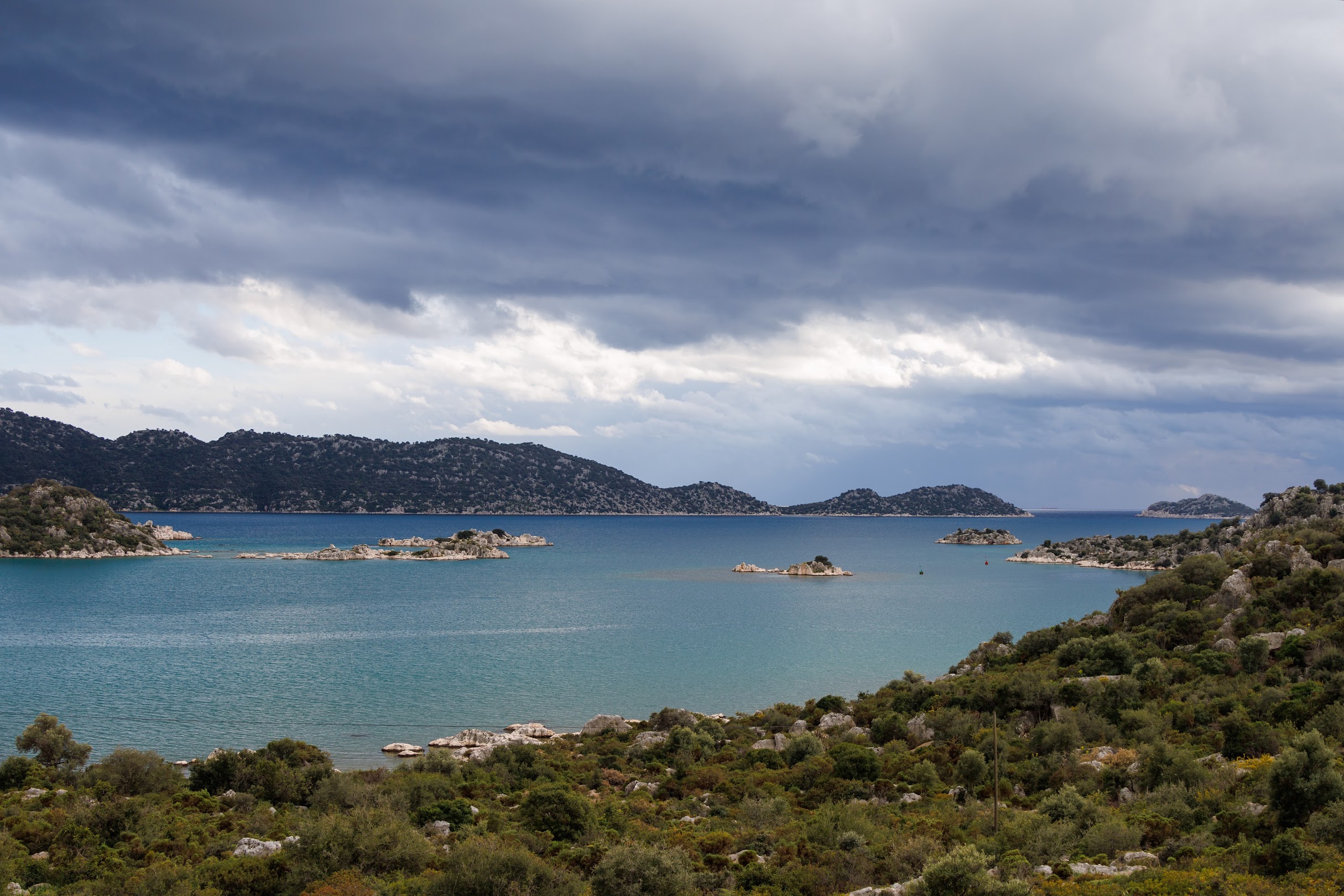 Grey clouds over the islands and shallow bays of the Kekova coast